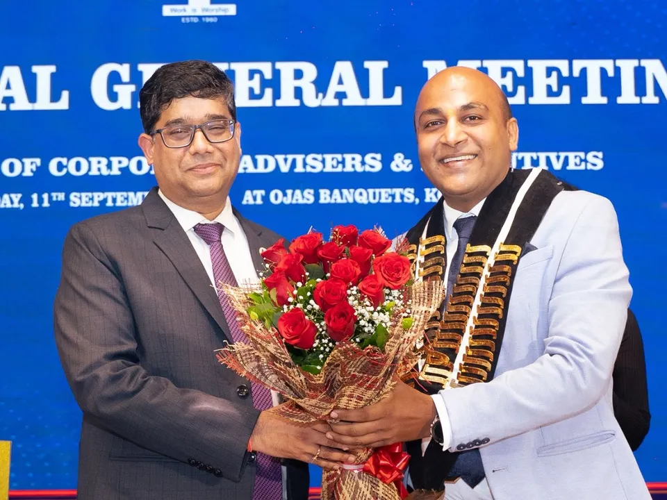 Ex President of ACAE  Adv (CA) Tarun Kr Gupta felicitates New President of ACAE  CA Niraj Kumar Harodia at the Annual General Body Meeting held at Kolkata.