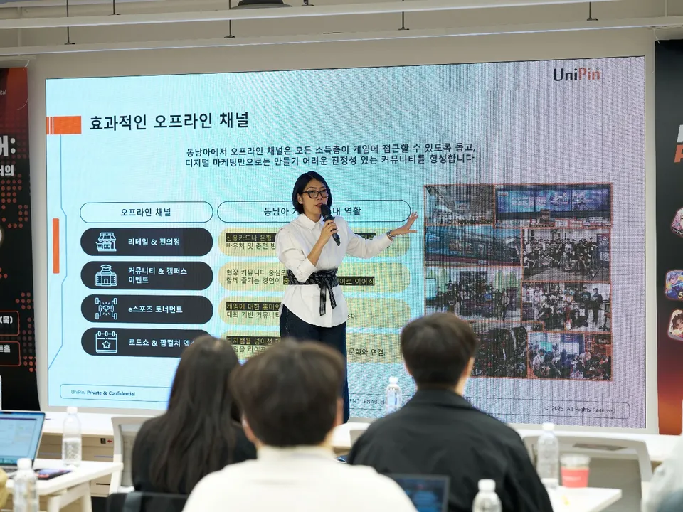 Poeti Fatima GM of UniPin Business Group presenting at the seminar