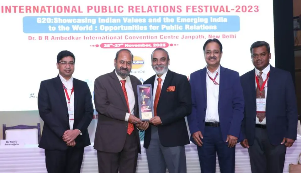 Director , NHPC, Shri Uttam Lal with the trophy conferred on NHPC
