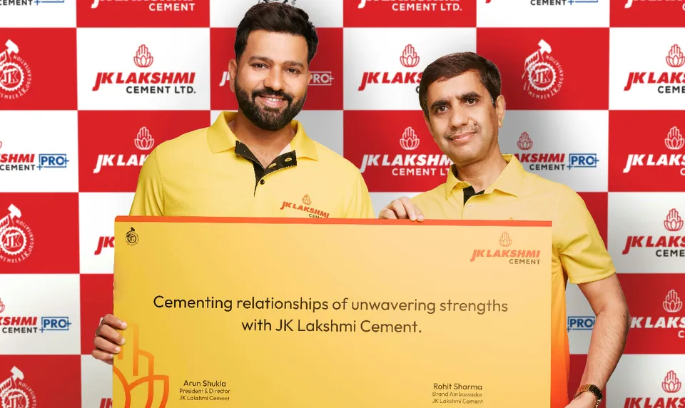 L-R- Rohit Sharma with Mr Arun Shukla, President and Director, JK Lakshm....jpg
