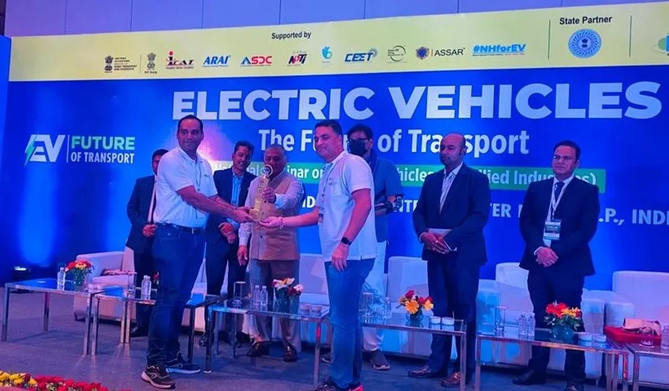 TelioEV team recieving the award..