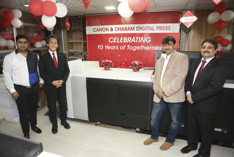 Mr. Manabu Yamazaki, President & CEO, Canon India, Mr. Puneet Datta, Senior Director-PPP, Canon India and Mr. Virendra Kasana, Owner of Dharam Digital Press during the installation of imagePRESS C10010 VP