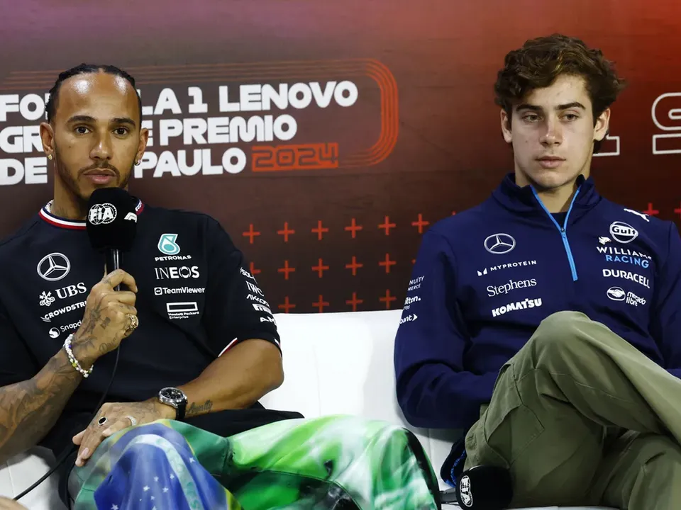 Franco Colapinto with Lewis Hamilton