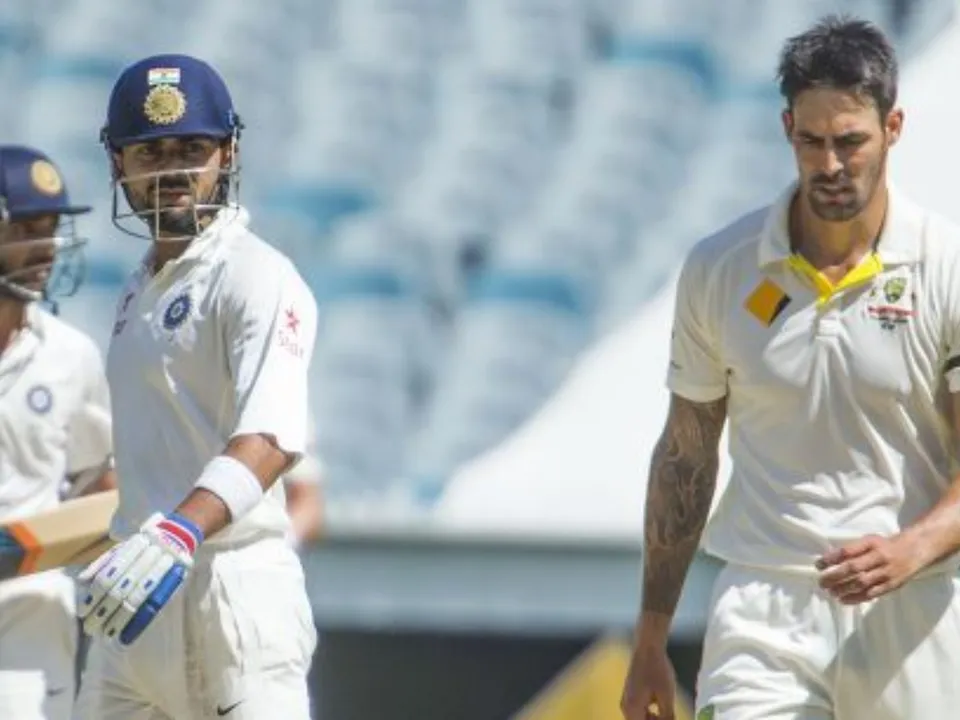 Virat Kohli and Mitchell Johnson