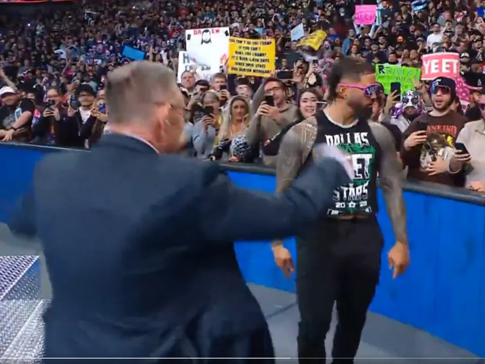 WATCH: Michael Cole leaves commentary desk, yeets with Jey Uso on WWE Raw