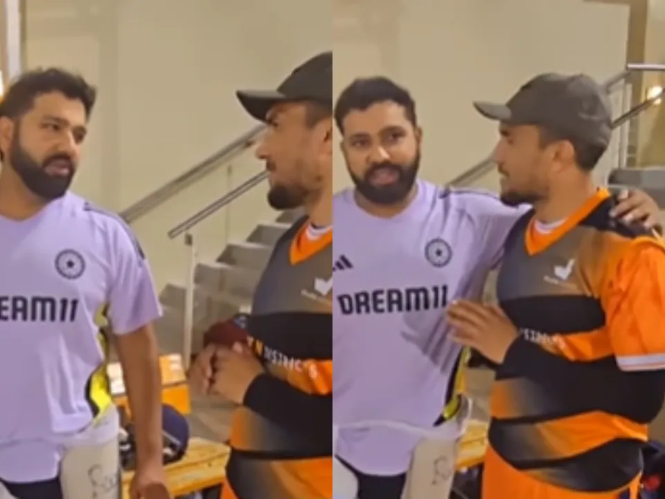 Rohit Sharma in conversation with Pakistan net bowler Awais Khan