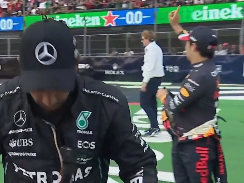 Sergio Perez saves Lewis Hamilton from the booing mexican crowd.