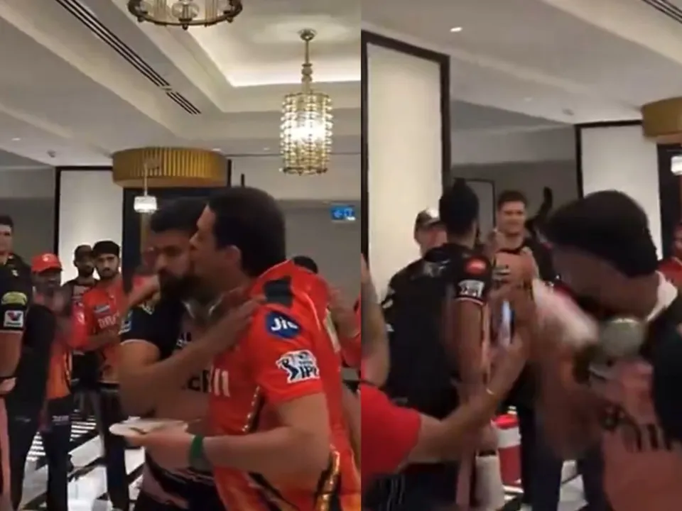 Ness Wadia kissing Shreyas Iyer during the celebration