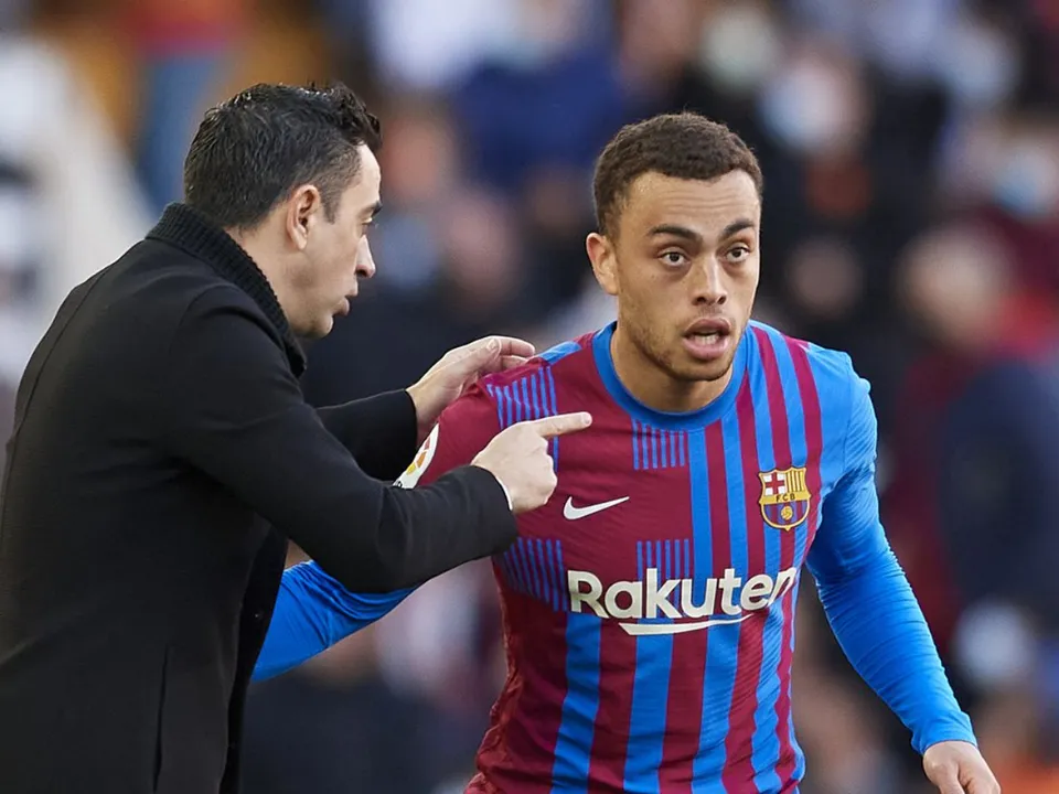 Xavi and Sergino Dest