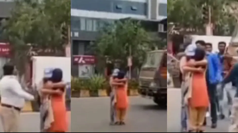 Lovebirds block traffic while hugging each other in middle of road, cop calms down fumed commuters; watch