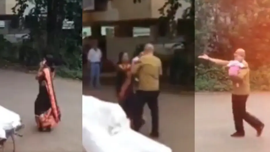 Woman busy on a mobile call leaves behind her baby inside the auto and walks off, watch